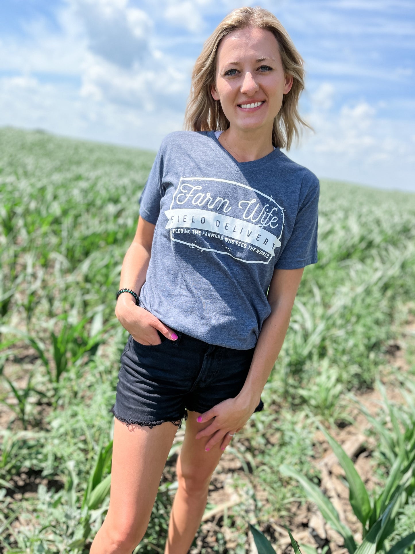 Women wearing a Farm Wife V Neck in field