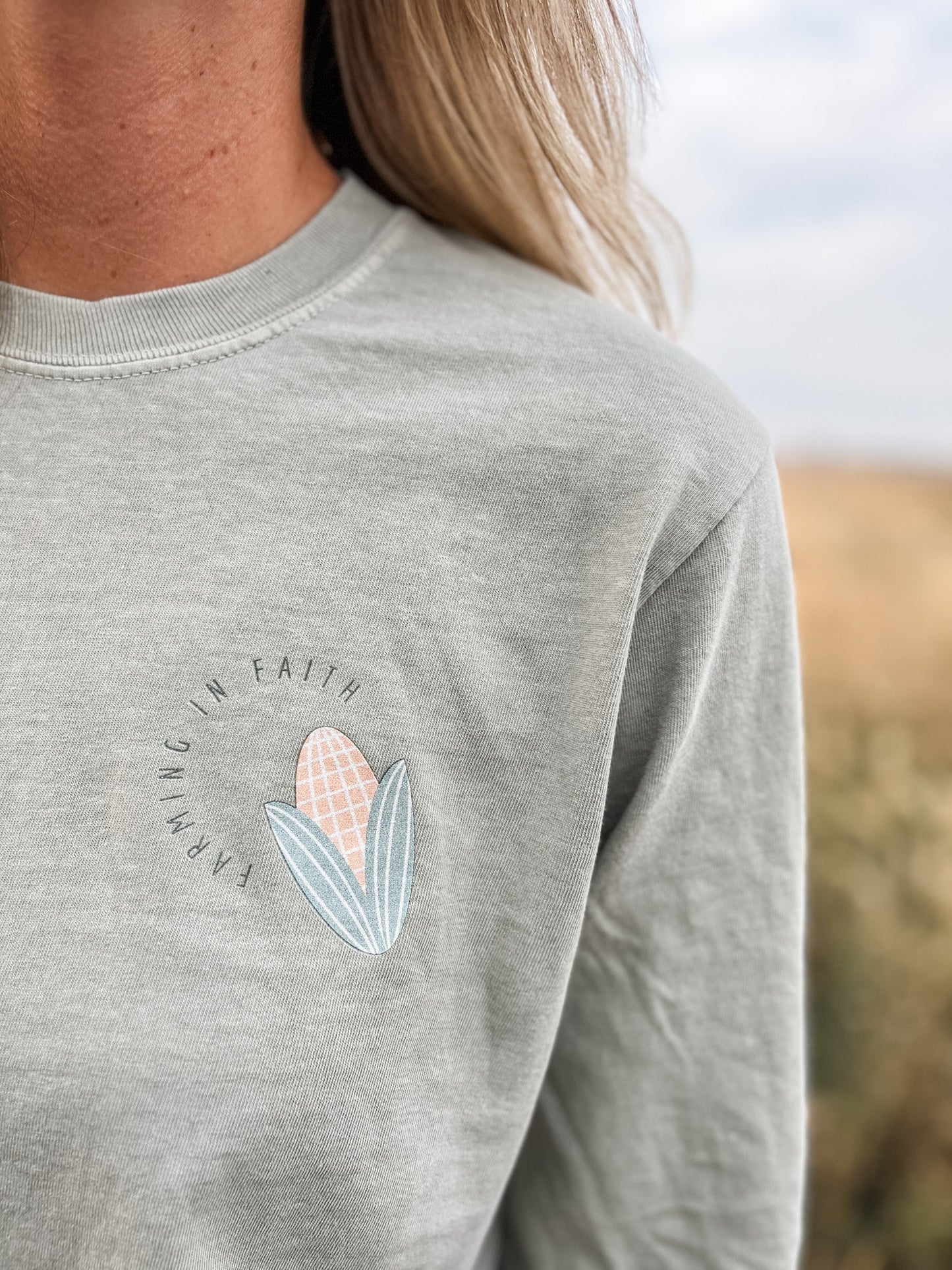 Close up of farming in faith long sleeve