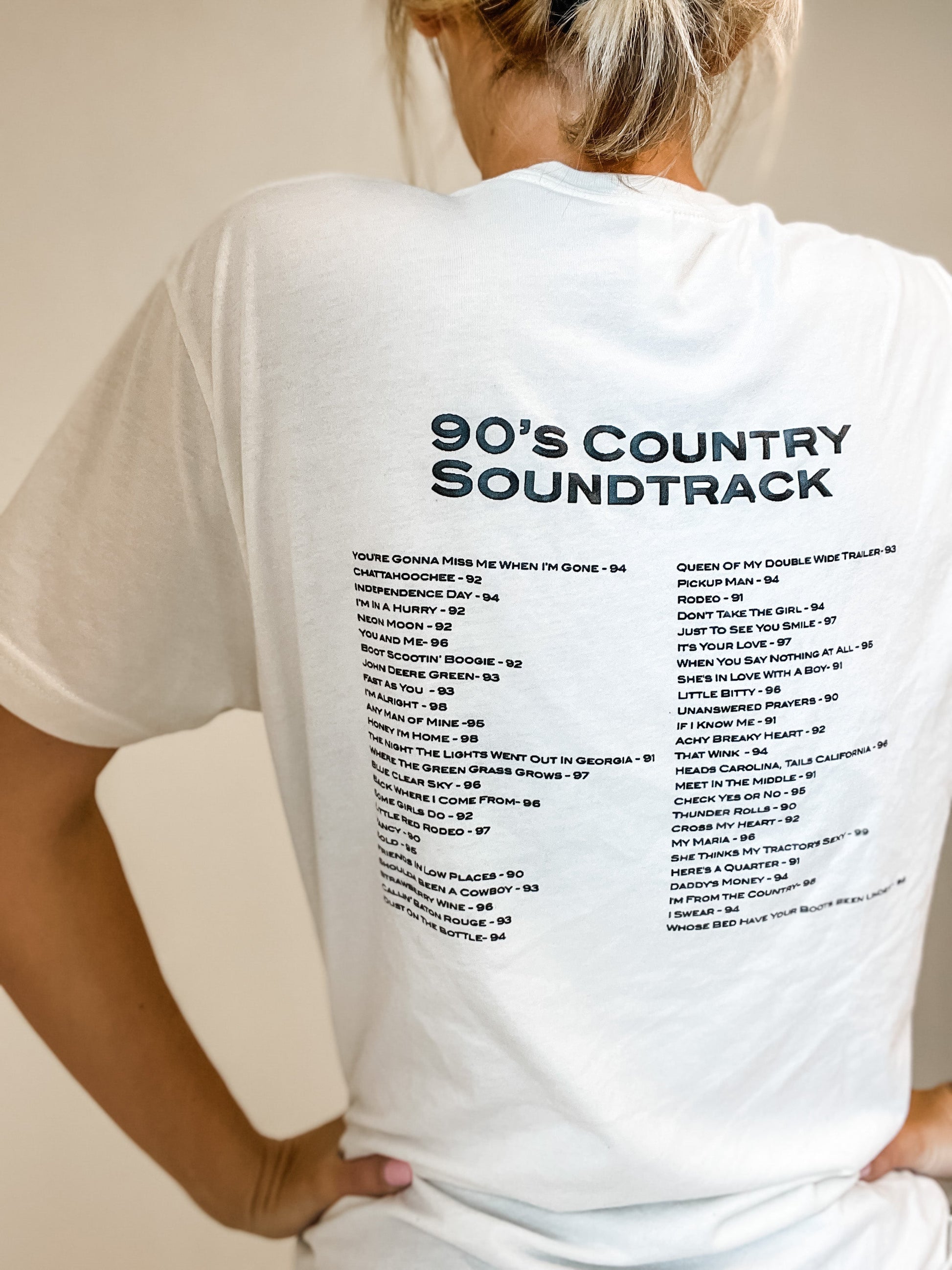 Back of 90s Country T Shirts worn by a woman